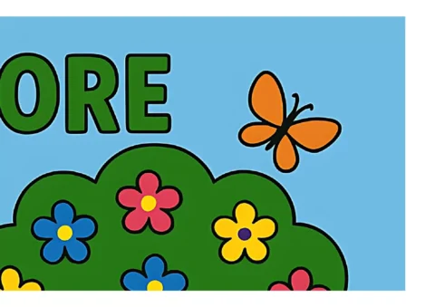 Um arbusto verde com flores coloridas e uma borboleta laranja voando ao lado.