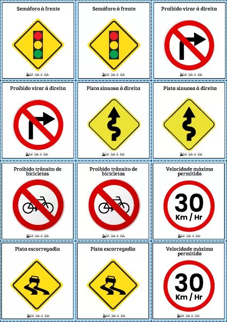 Conjunto de sinais de trânsito incluindo semáforos e placas de proibição e advertência.