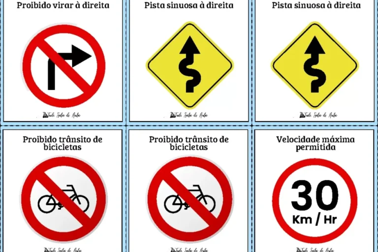 Conjunto de sinais de trânsito incluindo semáforos e placas de proibição e advertência.